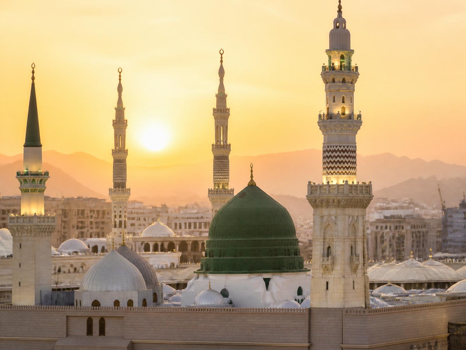 Masjid an-Nabawi's green dome at sunrise in Madinah